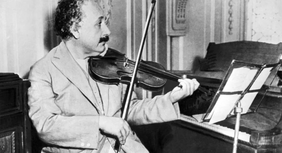 German-born physicist Albert Einstein plays his violin in 1931. AFP/Getty Images